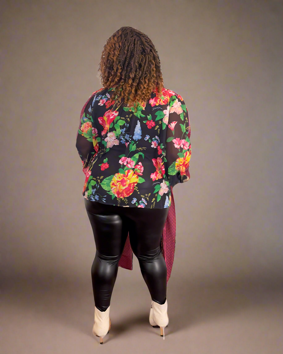 Step into style with the Floral Allure Bow Top — a chic floral blouse featuring a statement burgundy bow and sheer sleeves. Perfect for bold, feminine looks.